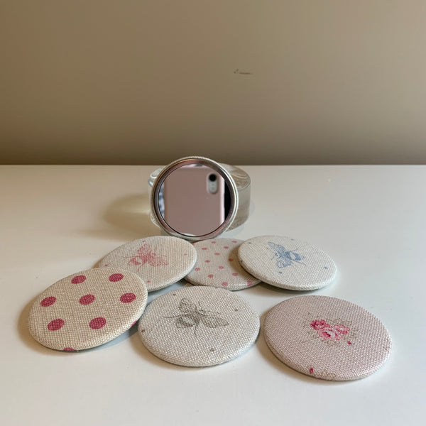 Compact Mirrors